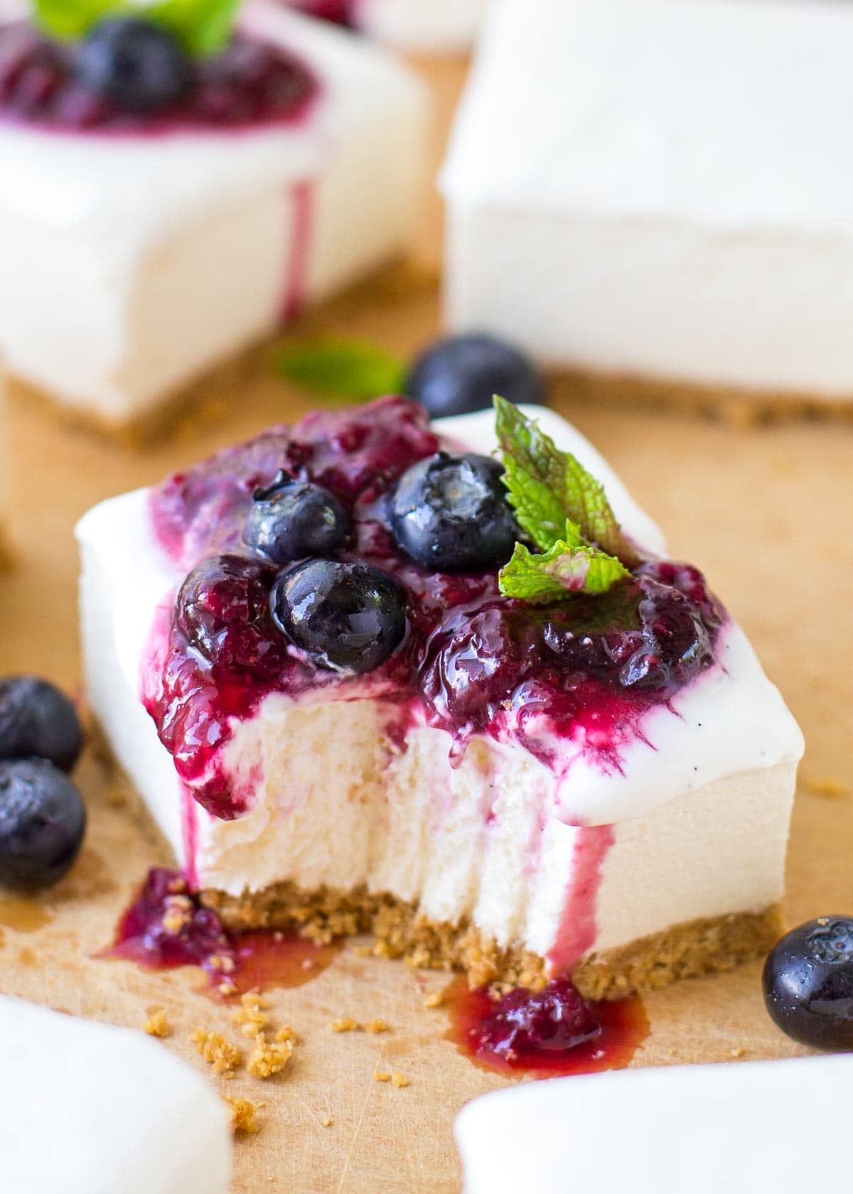 No bake cheesecake bar with a bite missing