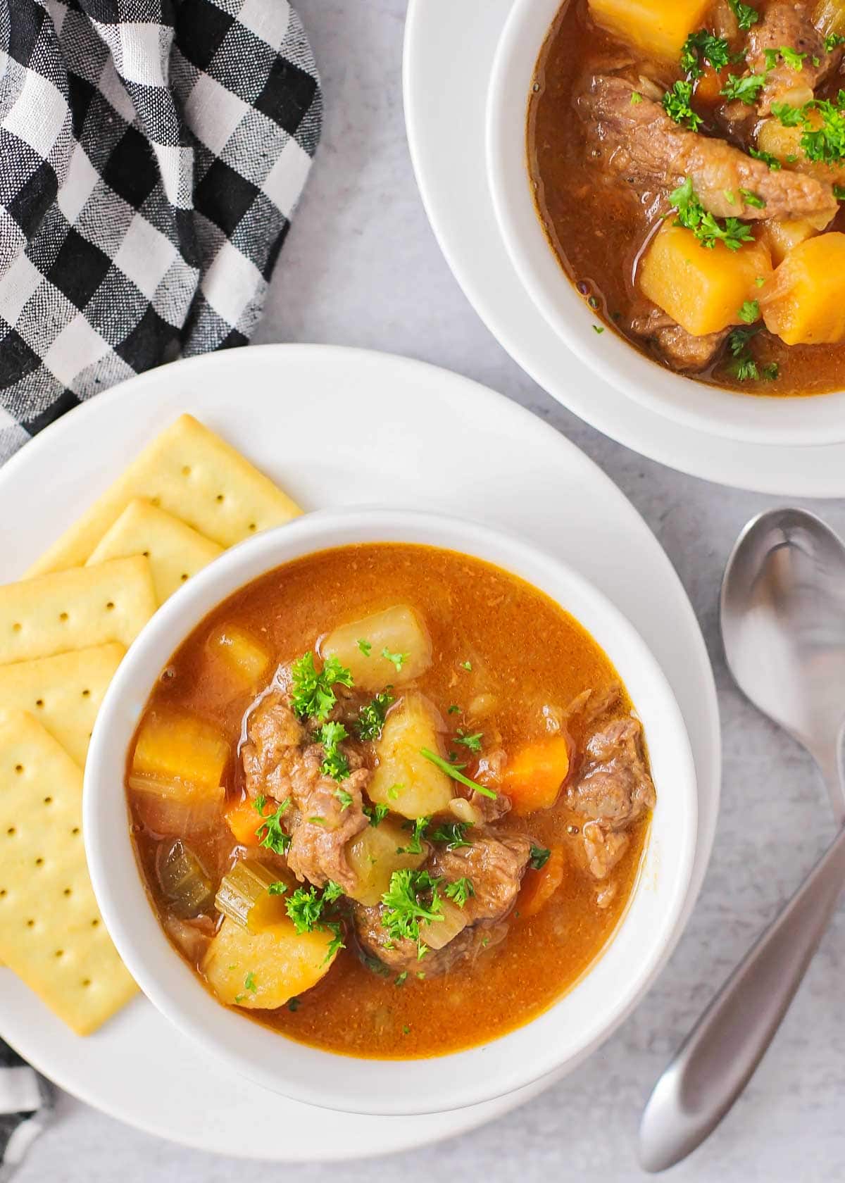 Two bowls full of instant pot beef stew