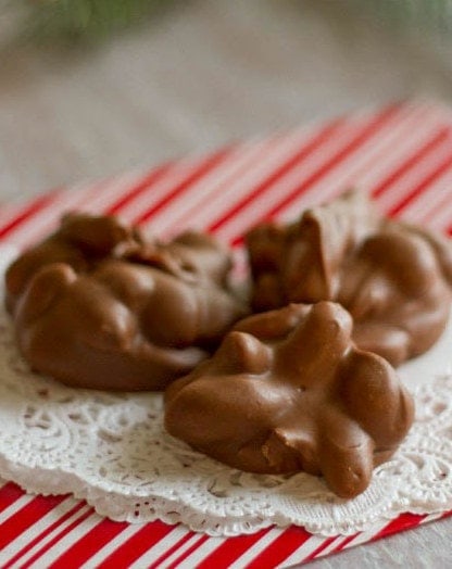 Peanut Clusters displayed on a red and white striped cloth.
