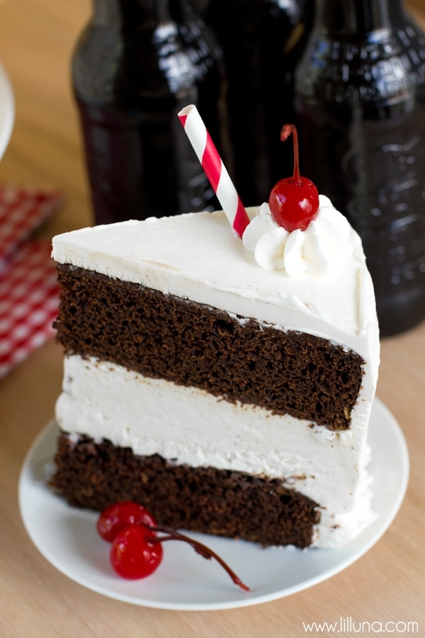 Delicious slice of Root Beer Float Ice Cream Cake on a white plate